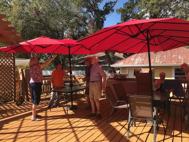 Members help install new furniture for our deck.